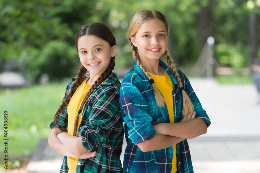 Childhood friends. Happy children have fun outdoors. Happy childhood. Enjoying leisure time. Childcare center. Childrens day. Summer vacation. School holidays. Casual fashion style Childhood friends. Happy children have fun outdoors. Happy childhood. Enjoying leisure time. Childcare center. Childrens day. Summer vacation. School holidays. Casual fashion style