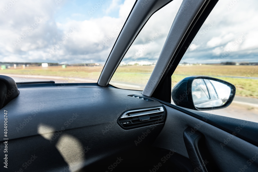 A man driving a car with a front view of the road. A man driving a car with a front view of the road.