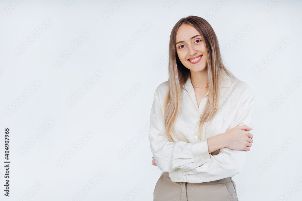 Cheerful happy young beautiful girl looking at camera smiling laughing on white background. Cheerful happy young beautiful girl looking at camera smiling laughing on white background.