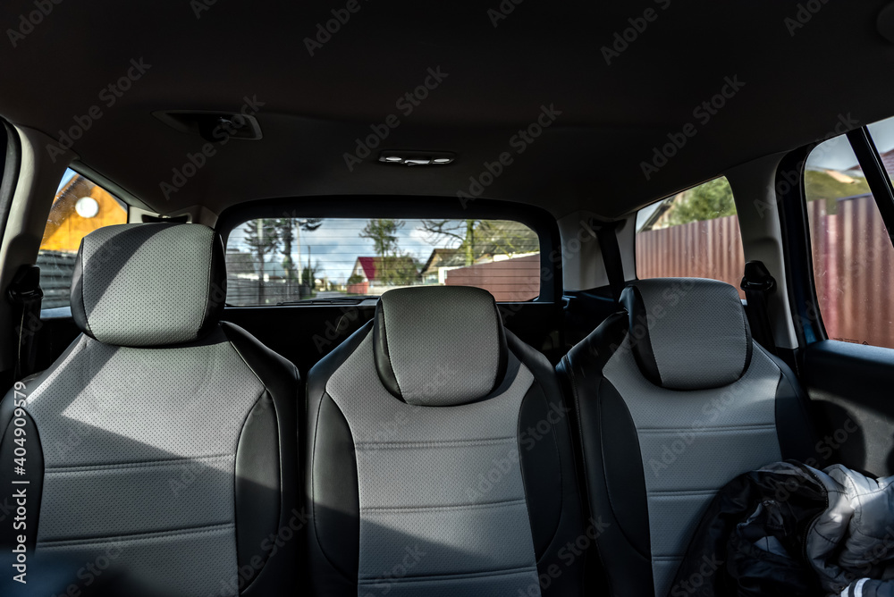 Back passenger seats in modern car.