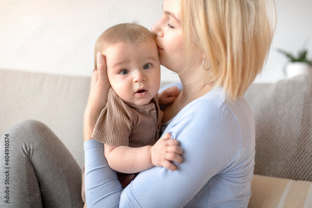 Beautiful lady bonding with her adorable baby Beautiful lady bonding with her adorable baby