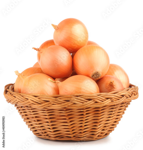 Onions in the basket isolated on the white background