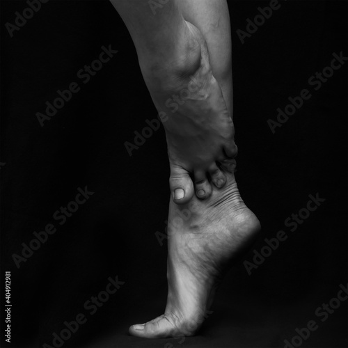Black and white photograph of a dancer's bare feet
