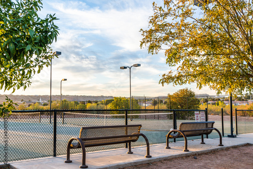 Fototapeta Naklejka Na Ścianę i Meble -  City park view of a tennis court. 