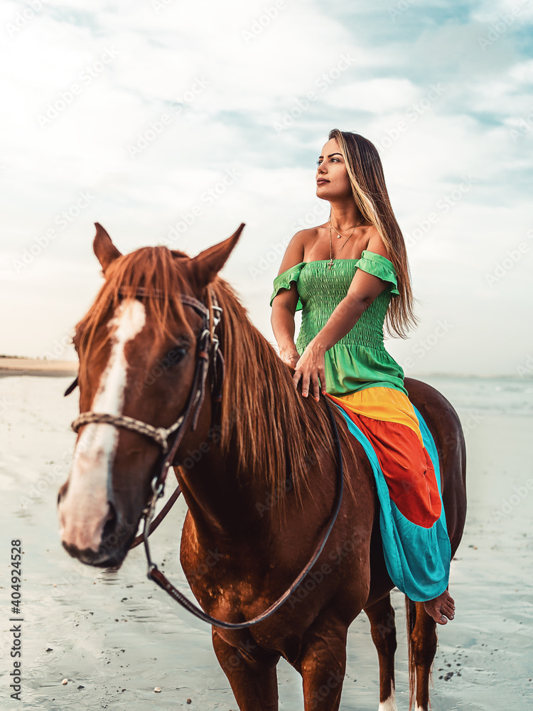 Fototapeta premium Woman on the horse beach, smiling - Jericoacoara - Ceará - Jeri