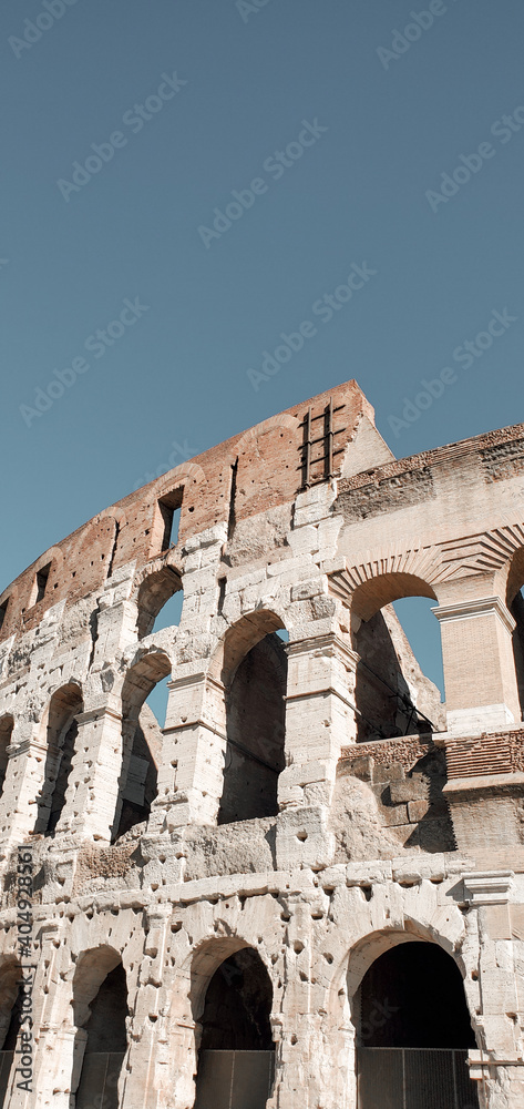 Arcs of Colosseo in Rome Italy without tourists with sunlight. View of Colosseum in Rome, Italy