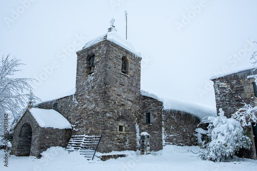 Sanctuary of Santa María a Real do Cebreiro under the snow photo