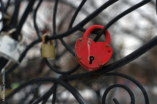 Close up of lock on iron construction. Locks of love its romantic tradition of newlyweds.