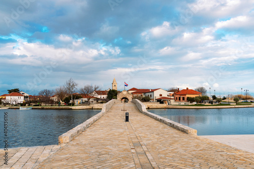 Old stone bridge and city gates of Nin town, Dalmatia, Croatia