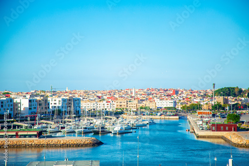 Canvas Print View Of Harbor In City Against Clear Blue Sky