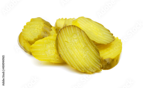 Fresh sliced green pickles isolated over white 