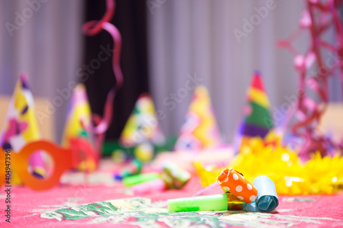 Party accessory, party horn, party noisemaker, serpentine streamer, party hats, end of party concept