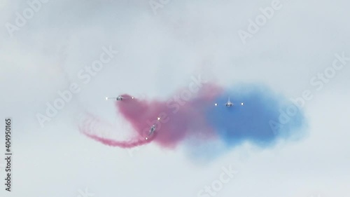 Black Eagles aerobatic team performing at airshow photo