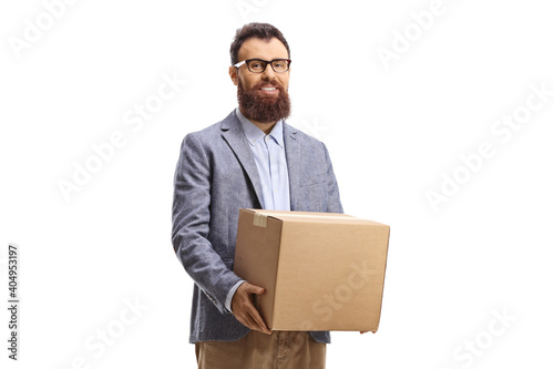Bearded man with glasses standing and holding a cardboard box