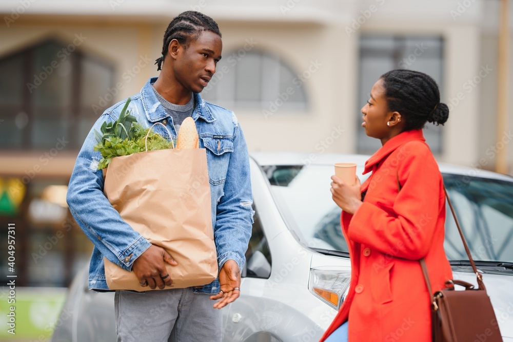 © Serhii - African american couple after supermarket © Serhii - African american couple after supermarket