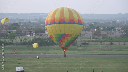 Hot air balloon and paramotors at Chinese airshow