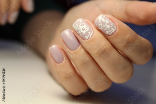 beautiful manicure of nails on the background of a fashionable