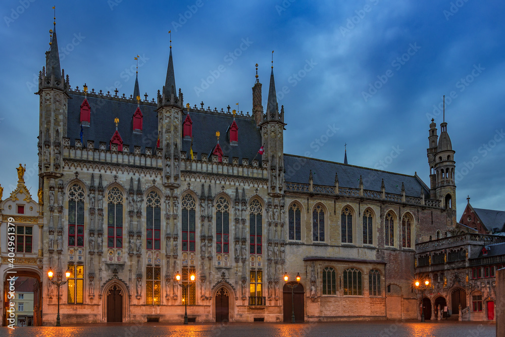 Bruges city hall and Basilica of the Holy Blood on the Burg square.