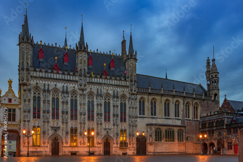 Bruges city hall and Basilica of the Holy Blood on the Burg square. photo