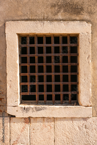 View of Juromenha castle with grid window in Alentejo  in Portugal