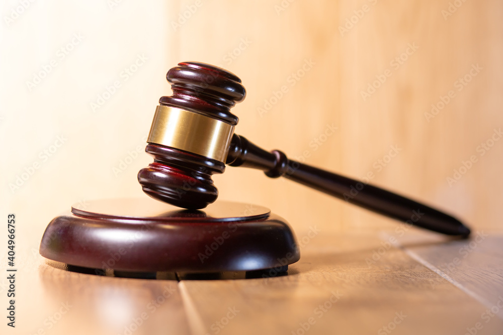 close up of judge gavel on the table close up of judge gavel on the table