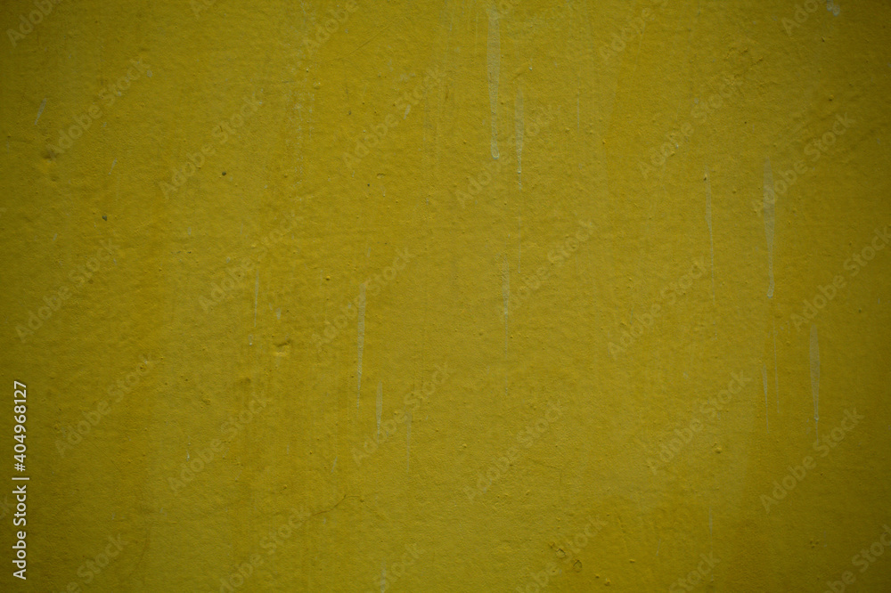Deep olive green painted wall background texture for vintage or retro themes in a full frame view. This is a lighter version, a darker version is also available in the portfolio