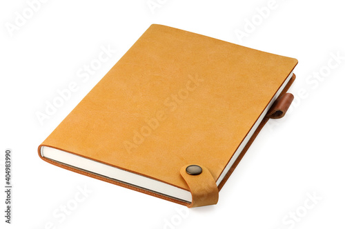 Closed brown leather notebook or diary isolated and white background with full depth and clipping path