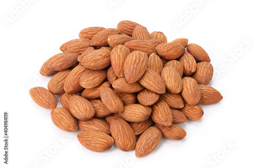 Close up group of peeled almonds nuts on white background isolated for your advertising