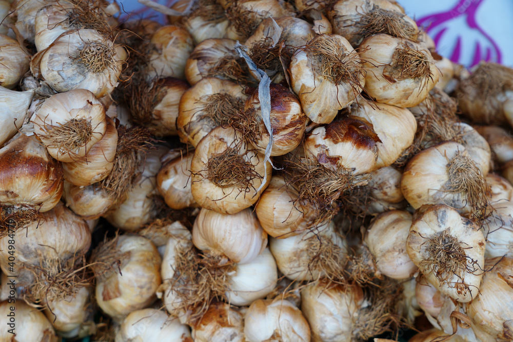 Dried smoked garlic at a French farmers market Dried smoked garlic at a French farmers market