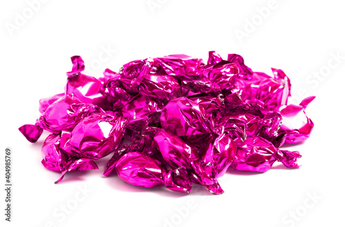 Pile of Pink Wrapped Candy Isolated on a White Background