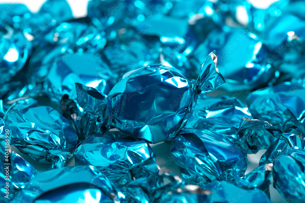 Background of Bright Blue Wrapped Candy