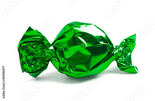 Naklejka Single Wrapped Green Candy on a White Background