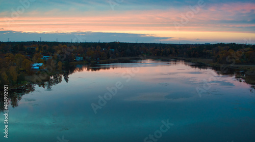 Fototapeta Naklejka Na Ścianę i Meble -  Idyllic sunset over lake