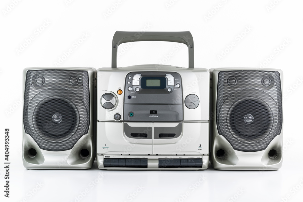 Vintage boom box style portable stereo radio, cd, cassette tape player and recorder on white. 