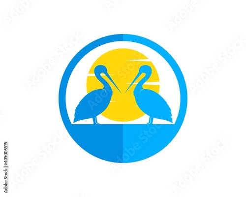 Circle shape with pelican bird and sun inside