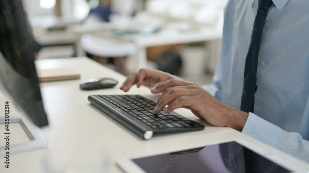 Hands of African Man Typing on Keyboard, Close Up Hands of African Man Typing on Keyboard, Close Up