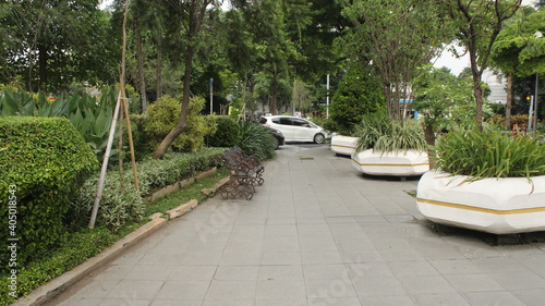 sidewalk in the middle of the park
