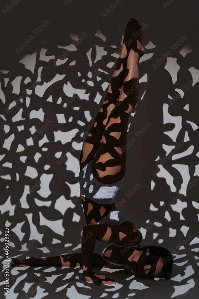 Fototapeta premium Girl dancer doing stretching
