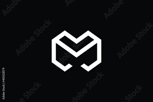 M logo letter design on luxury background. MM logo monogram initials letter concept. M icon logo design. MM elegant and Professional letter icon design on black background. M MM