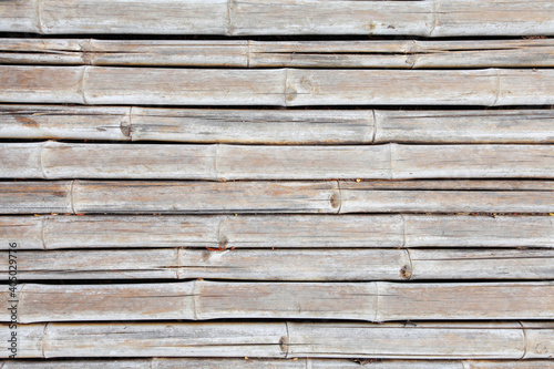 texture of yellow bamboo wall, background from fence