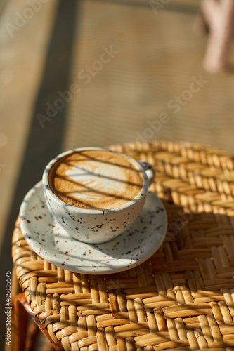  hot latte art coffee on wooden