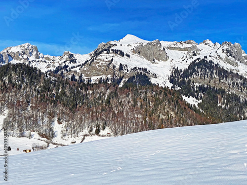 Winter snow on alpine peaks Lütispitz (Luetispitz or Lutispitz), Schofwisspitz and Schwarzchopf in Alpstein mountain range and in Appenzell Alps massif - Canton of St. Gallen, Switzerland (Schweiz) photo