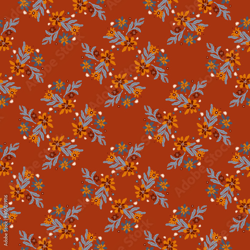 Creative seamless pattern with blue colored branches and flowers outline print on brick colored background.