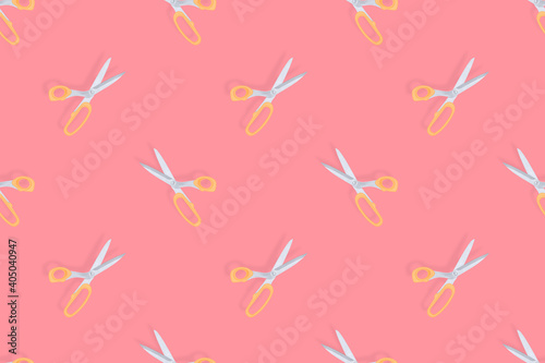 Scissors seamless pattern. Barber scissors against red background background.