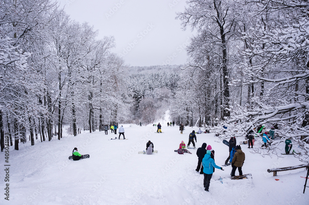 Citizens have a rest during the New Year holidays skiing and snowboarding from the mountain