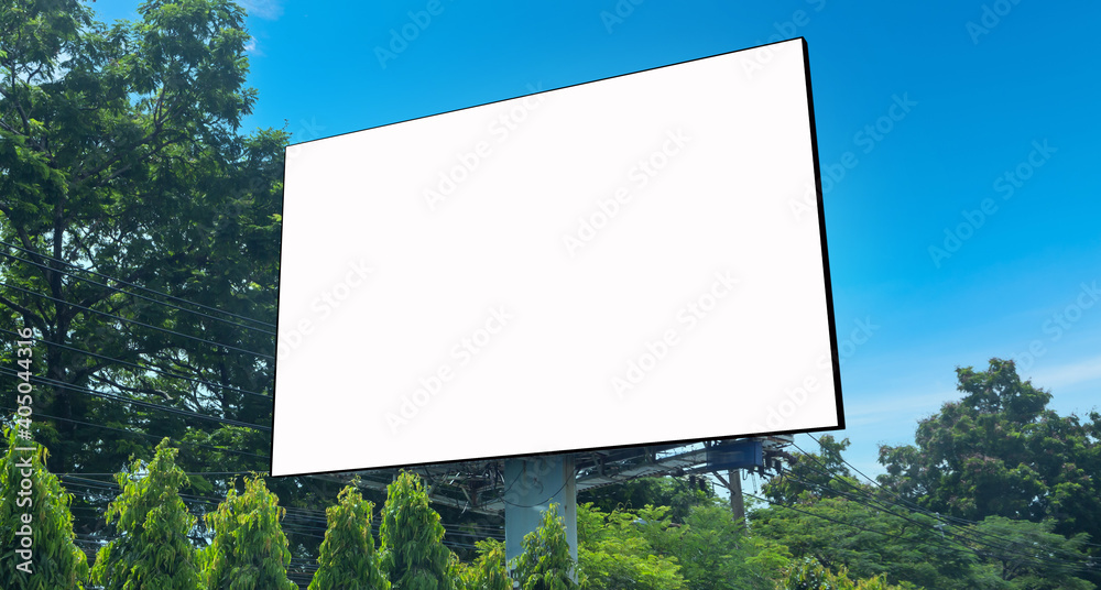 Billboard on the background of the city. Mock-up