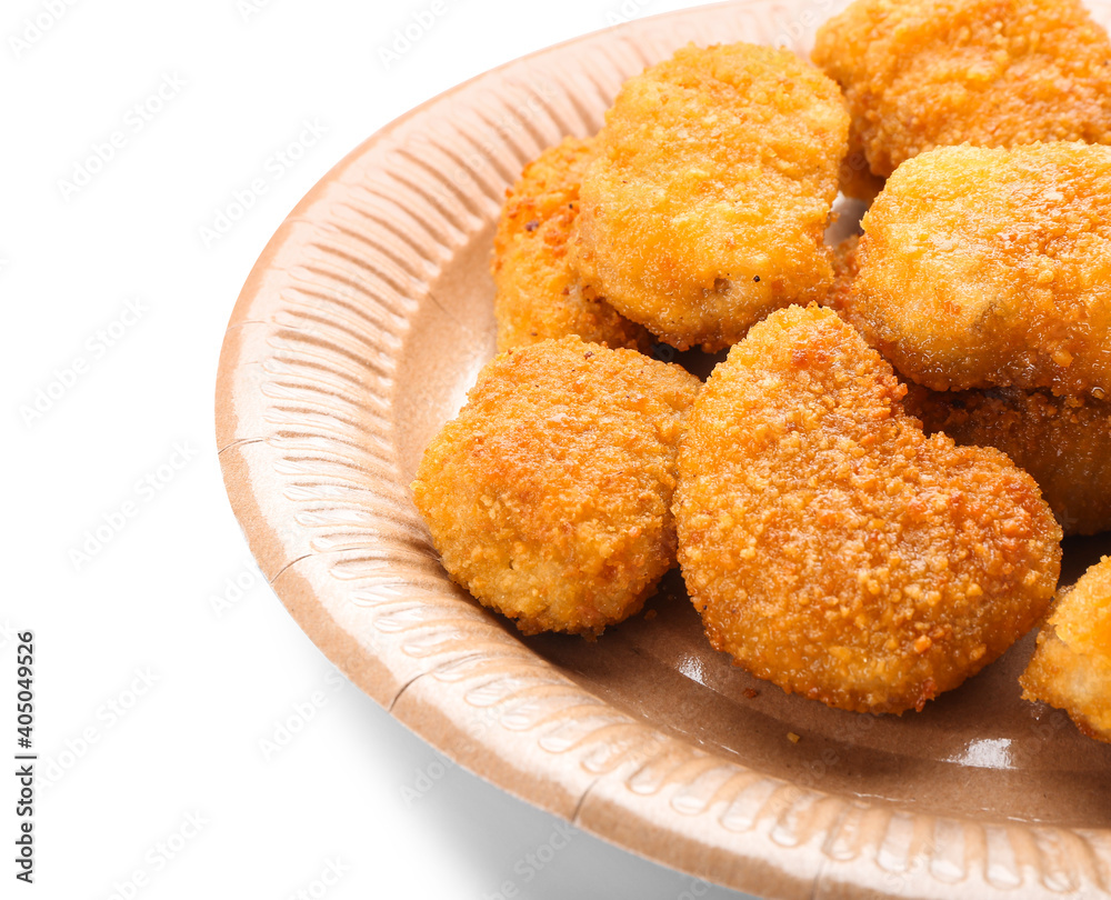 Plate with tasty nuggets on white background, closeup