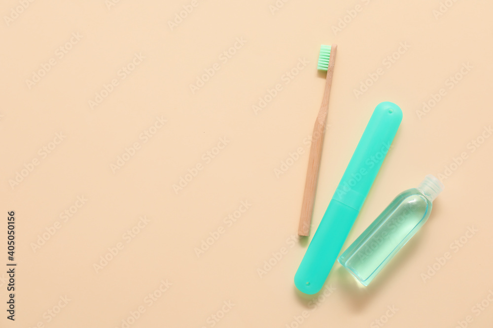 Toothbrush, case and mouth rinse on color background Toothbrush, case and mouth rinse on color background