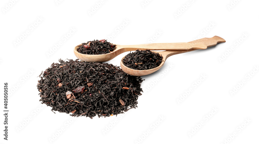 Heap of dry black tea leaves with spoon on white background Heap of dry black tea leaves with spoon on white background