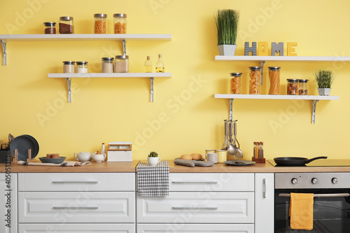 Interior of modern kitchen with shelves © Pixel-Shot